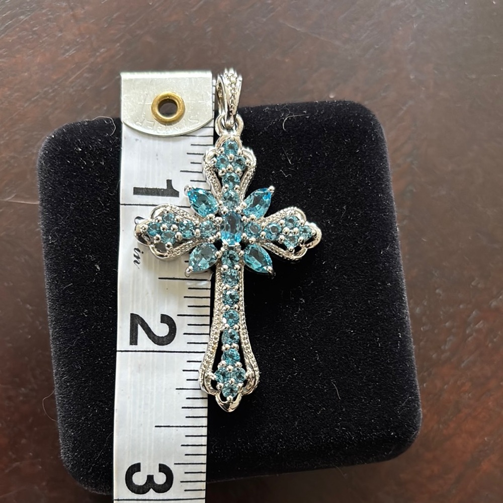 Elegant Silver and Blue Cross Pendant